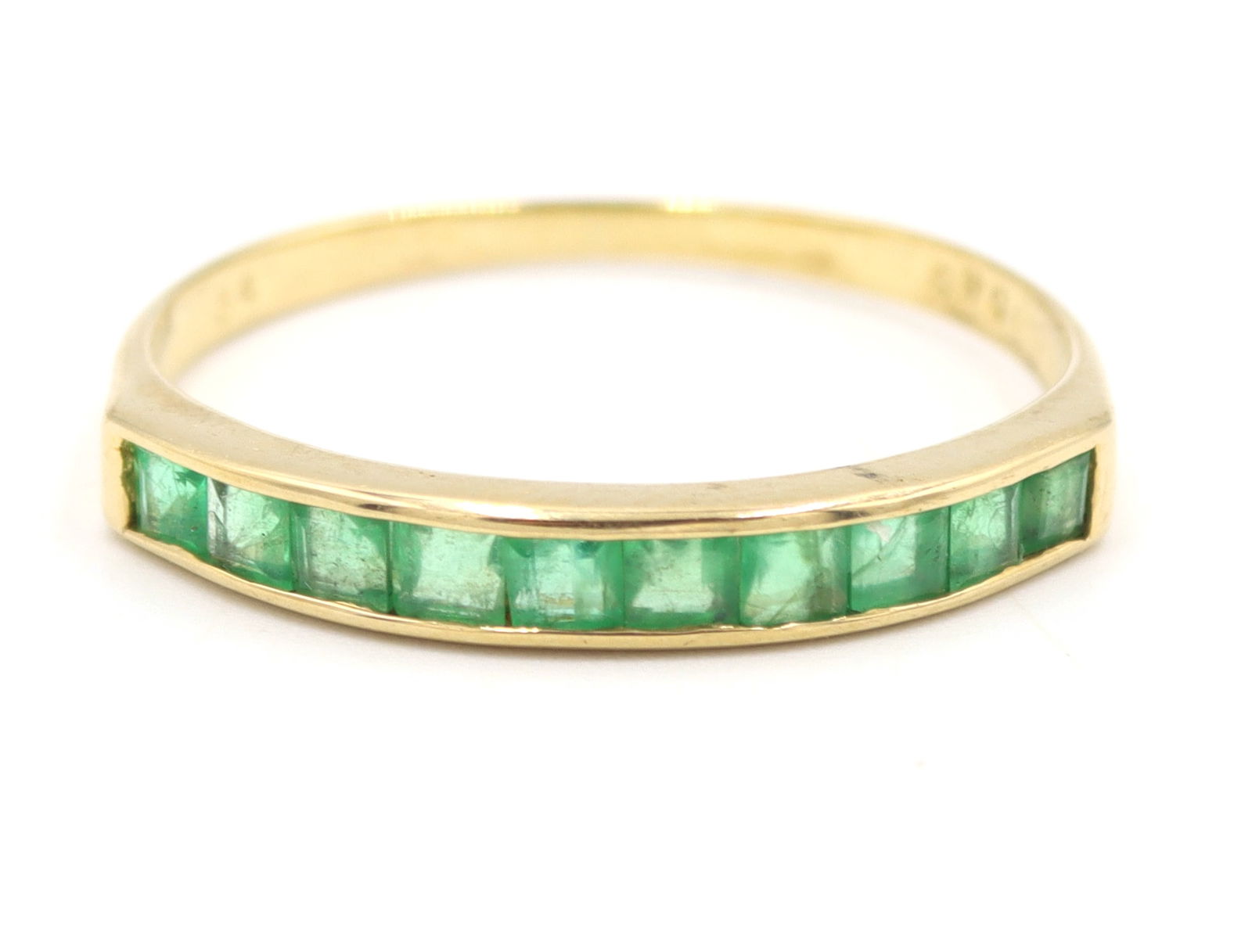 14kt Yellow gold princess cut emerald invisible set stackable band (1 of 4)