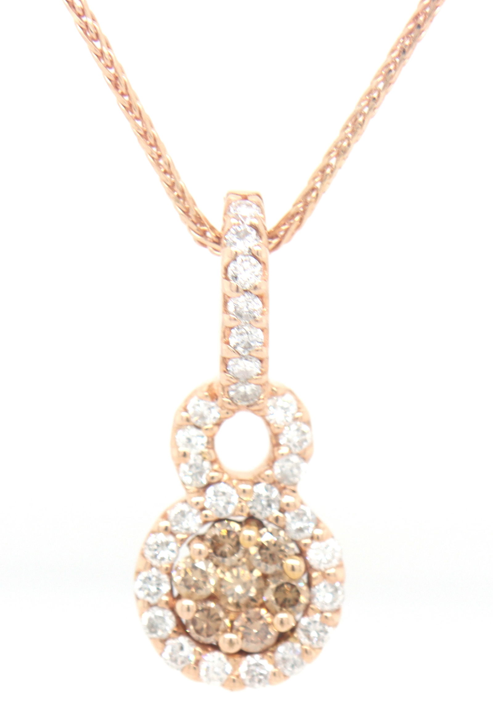 14kt Yellow gold 0.55ctw brown and white halo cluster pendant on chain: 14kt Yellow gold approximate 0.55ctw brown and white halo cluster pendant on adjustable 14-16 inches chain necklace. Total weight of necklace is 4.50grams.