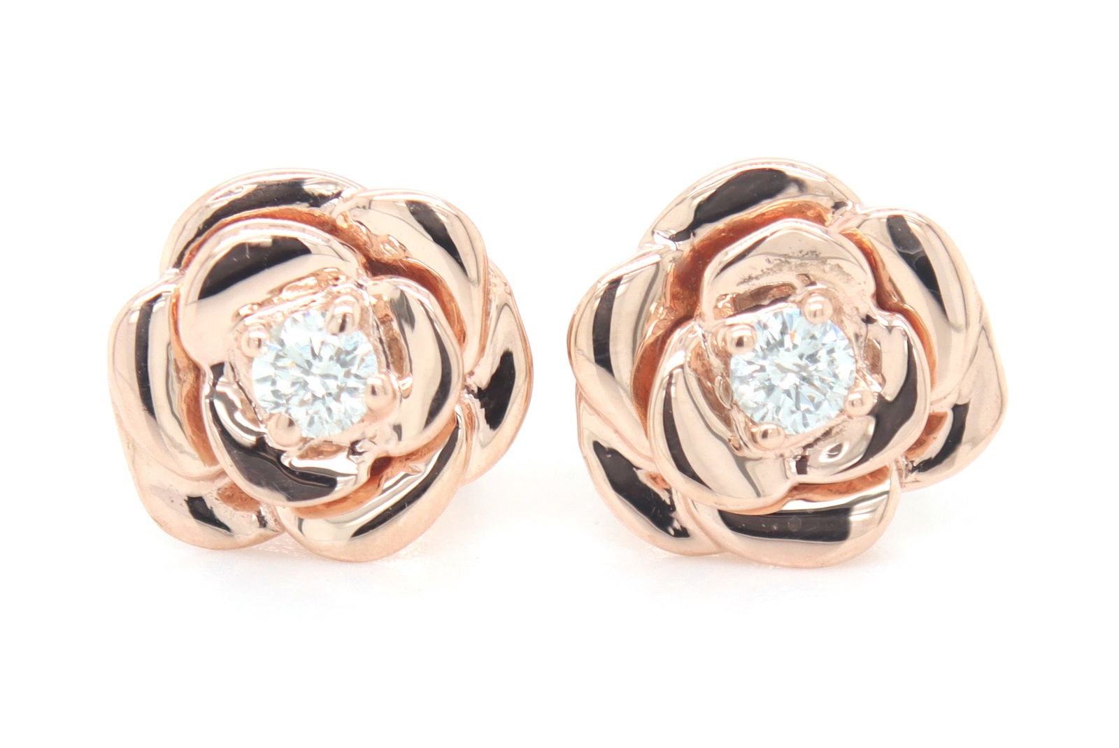 10kt Yellow gold Disney Enchanted 1/10ctw diamond belle earrings: 10kt Yellow gold Disney Enchanted 1/10ctw diamond belle earrings. Total weight of earrings is 1.90 grams.