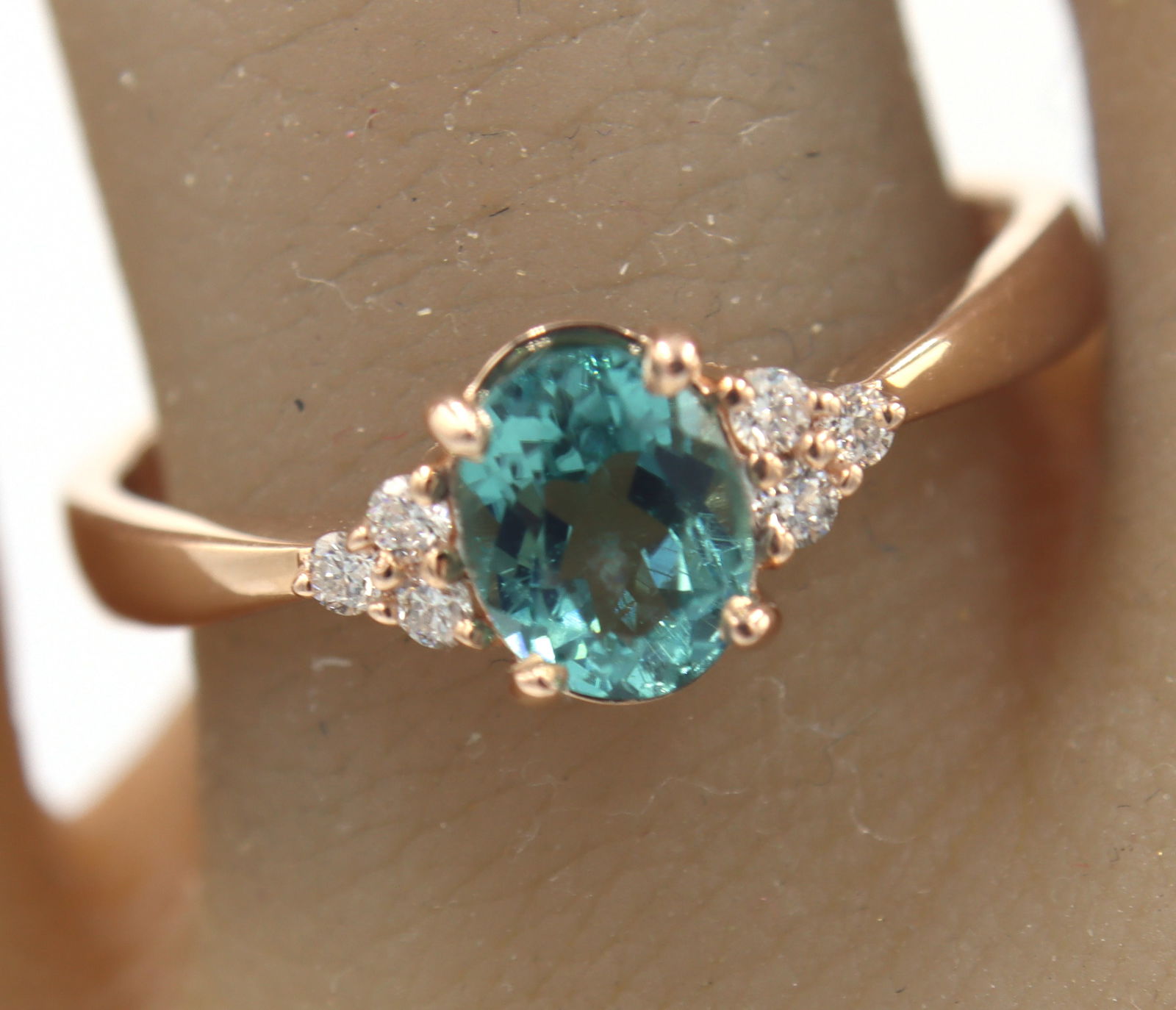 14kt Rose Gold oval Blue Zircona and Diamond Ring (1 of 5)