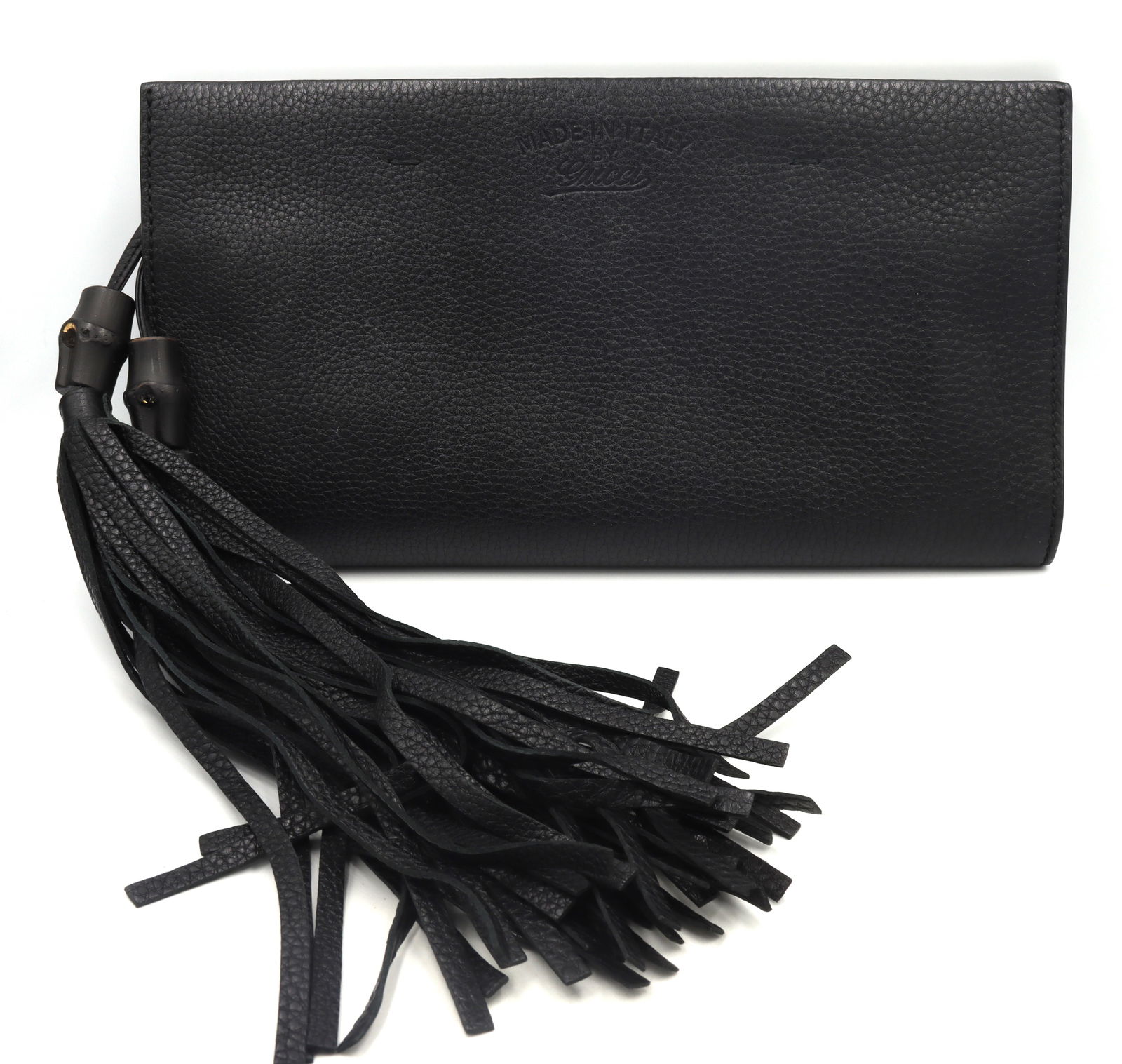 Gucci black leather clutch with Tassel: Gucci black leather clutch with Tassel. Made in Italy.