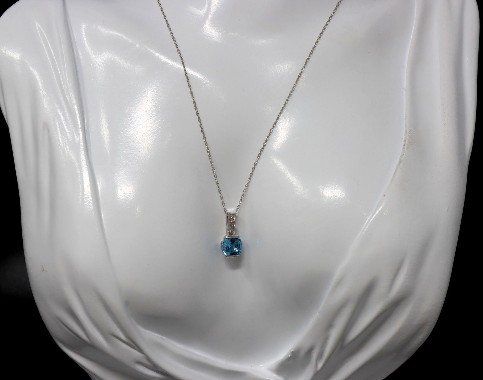 10kt White gold blue topaz and diamond pendant on chain (1 of 6)