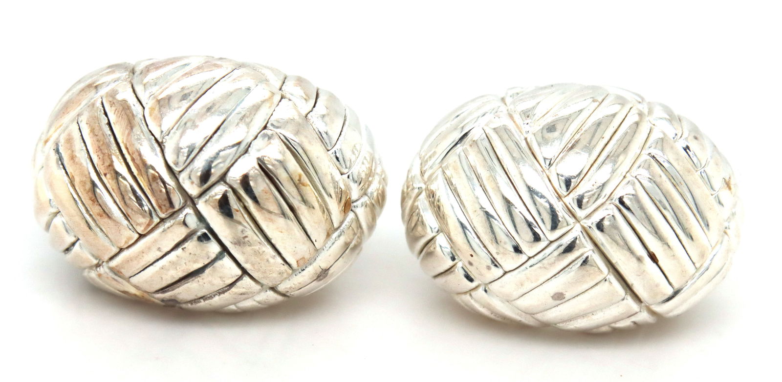 925 Sterling silver Woven look omega earrings: 925 Sterling silver Woven look omega earrings. The total weight of the earrings is 8.90 grams.