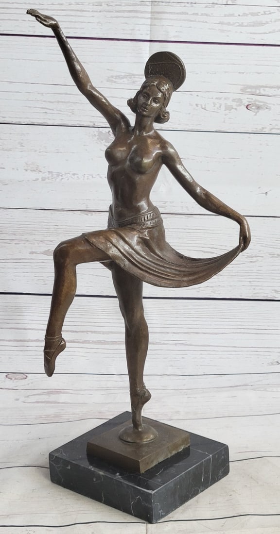 Dancer Bronze Sculpture: This spectacular early 20th c French reproduction bronze was made by Henri (Enrique) Molins-Ballester (1893-1958). It depicts an iconic Art deco dancer in motion with one of her legs kicked upward and