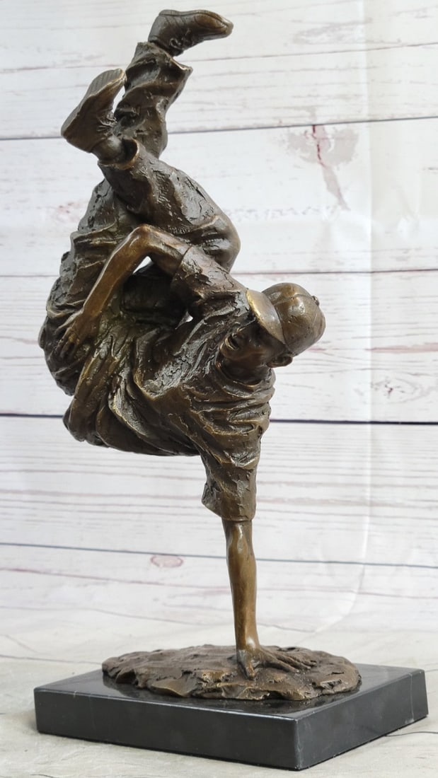 The Hip Hop Boy Dancing Bronze Statue: The abstract art figure is dancing in a very elegant and graceful fashion. A fine piece for a dance studio or collector of modern art dance sculptures. This sculpture was created by the lost wax metho