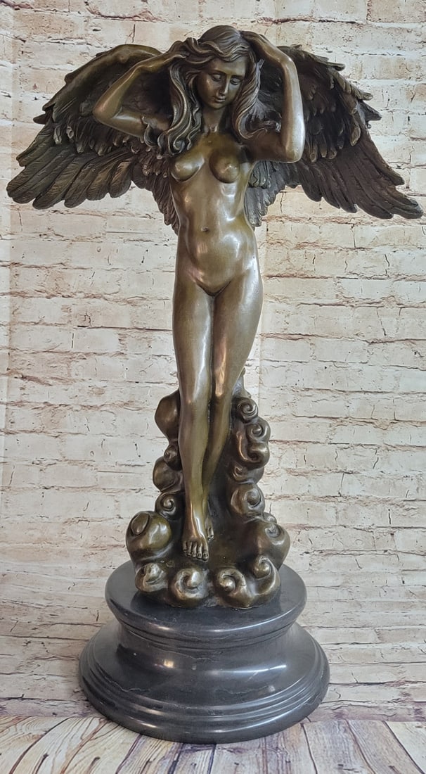 Descending Night Bronze Sculptor: This famous piece entitled Descending Night was crafted by Bronze Sculptor. It depicts a beautiful nude angel. Her head tilted downward, her fingers are combing through her hair that cascades in soft
