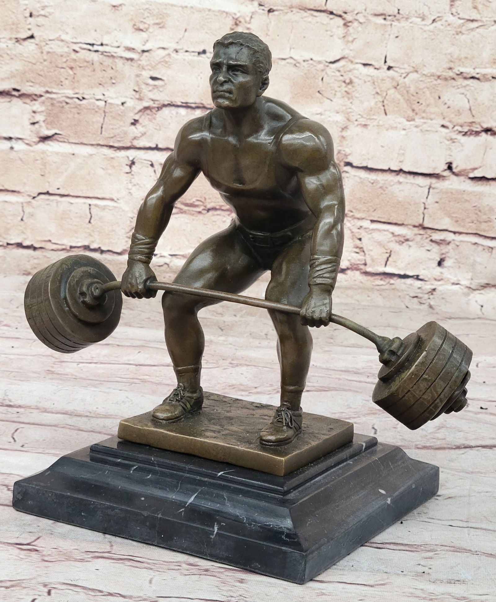 Power Weightlifters Sport Memorabilia Bronze Figure: Weightlifters everywhere will appreciate the detail of this amazing piece. His musculature, vascularity, gear, and expression are all superb. This would make a tremendous trophy at your next weightlif