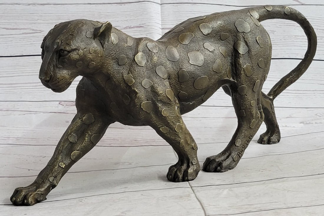 Animal Edition Leopard Bronze Sculpture: Her muscles flex as she walks across the open fields. This Sculpture draws you into the action and lets your imagination run wild as you join her on her walk across the wide-open plains of the outdoor