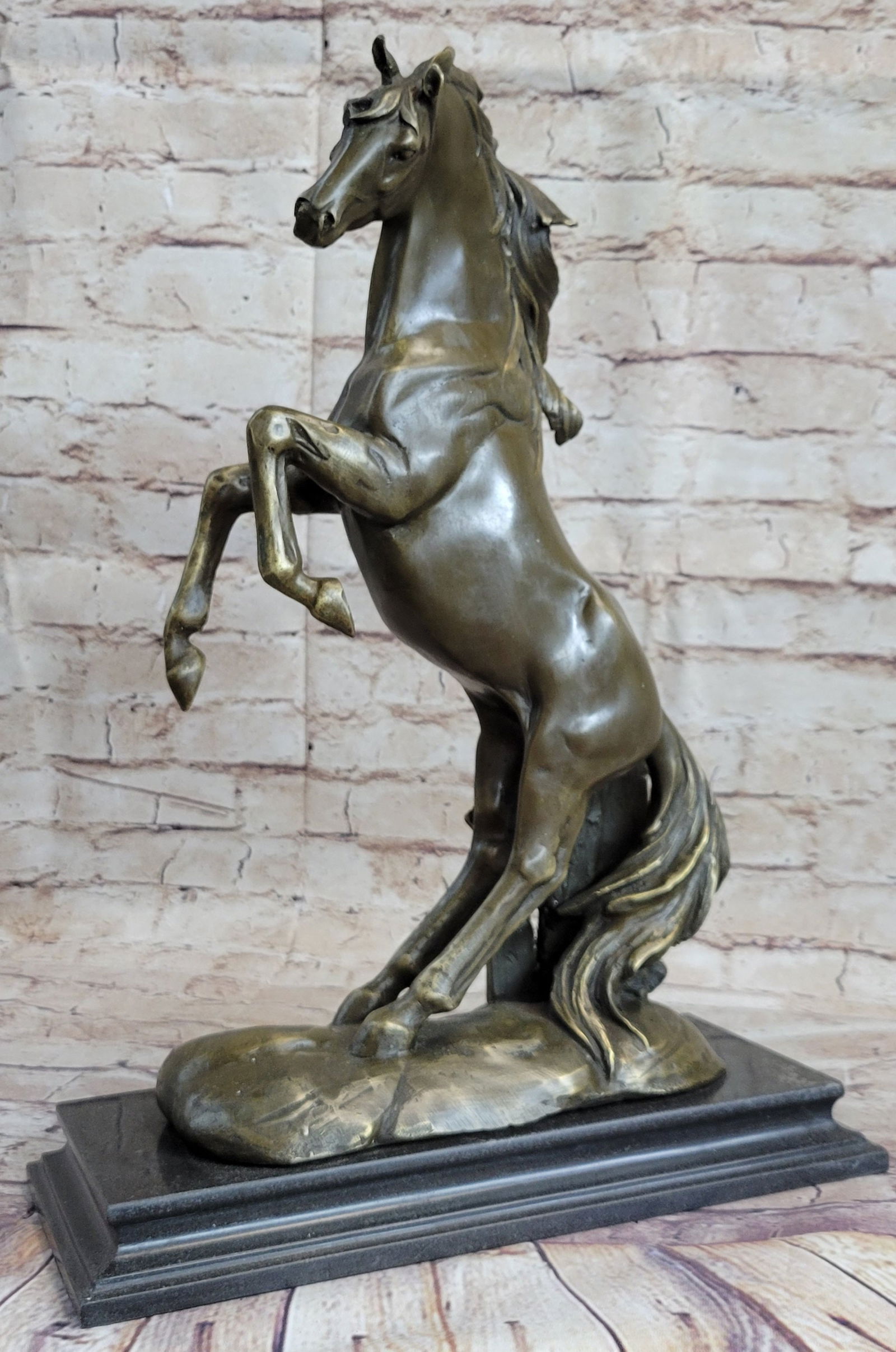 Wild Stallion Horse Bronze Sculpture: Wild with fear and excited the horse rears on his hind legs. His mouth opens wide letting out a loud neigh, a sound that may warn humans and animals around him. A rearing horse although magnificent is