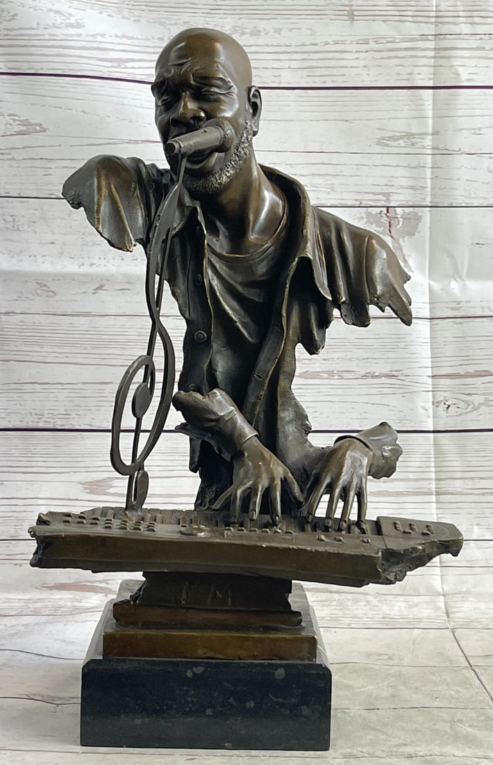 Isaac Hayes Singer Songwriter Bronze Sculpture: The late Isaac Hayes was a singer, songwriter, and voice actor. He lent his talent to creating the hit theme song for Shaft winning him the Academy Award for best song. This sculpture is an innovative