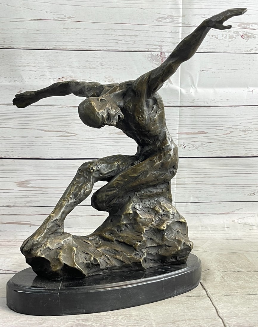 Man Bronze Statue: This highly detailed modern bronze figure is inspired by the ancient Chinese martial art of tai chi chuan. His sculpted body in action is reminiscent of peace and tranquility. The lithe movements and