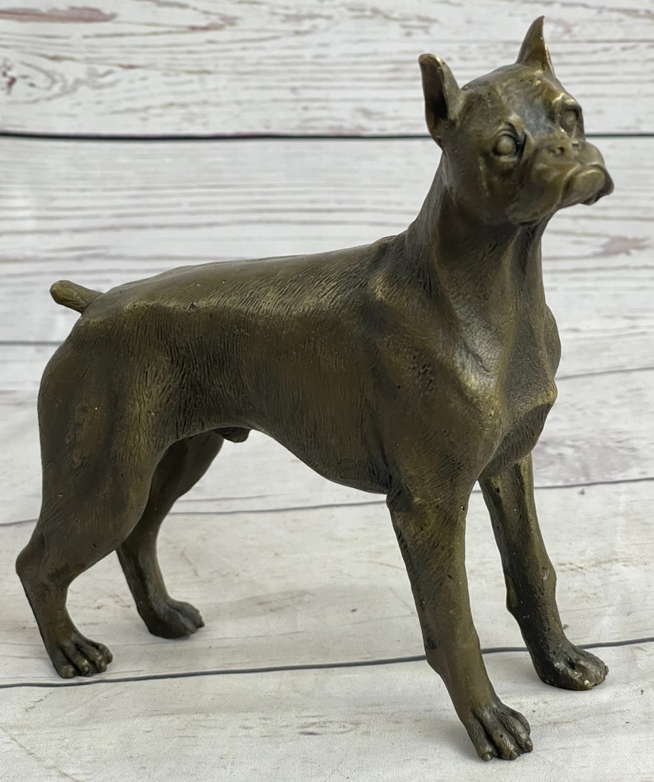 English Boxer Dog Bronze Sculpture: This cute English bulldog or Boxer does not have any problem guarding your front door! He is ready to meet you and greet you and welcome you home from a hard day\'92s work. He has a stocky body and a