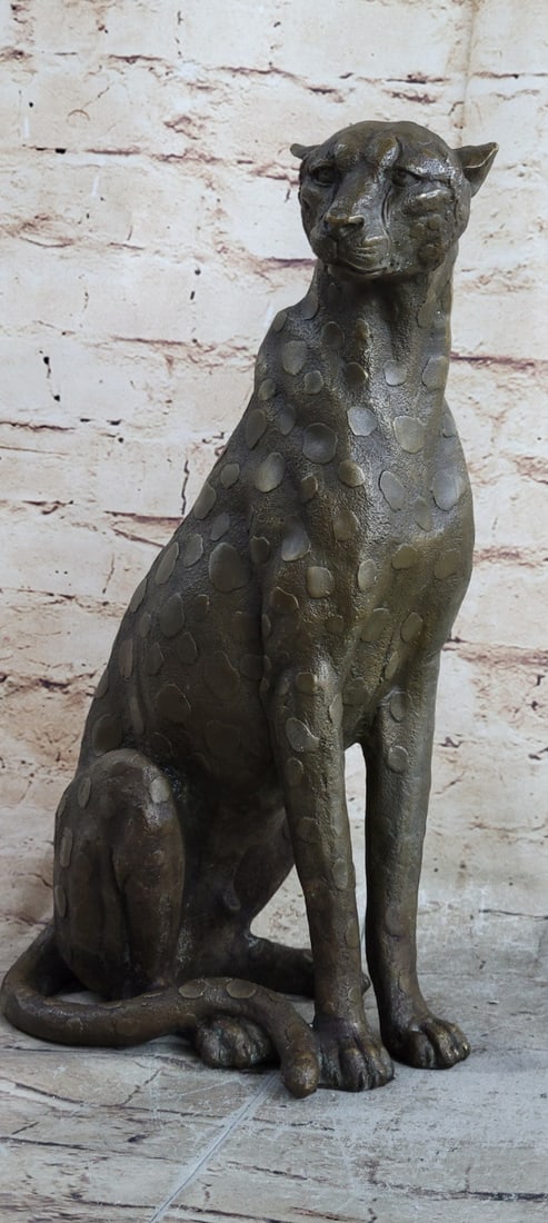 Cheetah Cougar Wild Life Bronze Sculpture: With stealth and breathtaking beauty, this cheetah peers deep into the distance, instilling a sense of respect and exuding natural beauty. This bronze bust of a cheetah captures the true characteristi