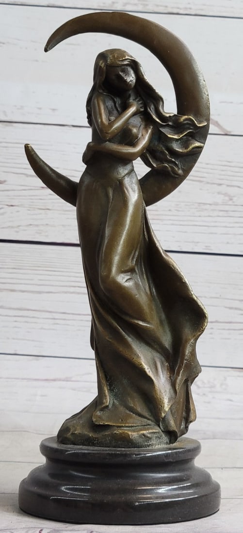 Goddess of Love Beauty Venus Bronze Statue: This bronze sensual woman stands upward, extending her hands behind her head. Her arms wrap around her head in a grasp of fervor. Her furrowed brow and closed eyes signify her unrelenting passion. The