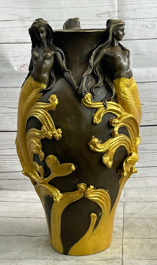Vase Planter Bronze Statue: This beautiful art nouveau vase shows three beautiful Mermaids holding hands accompanied by a bundle of flowers and vines. This vase severs as a multipurpose. It can place flowers in or just for simpl