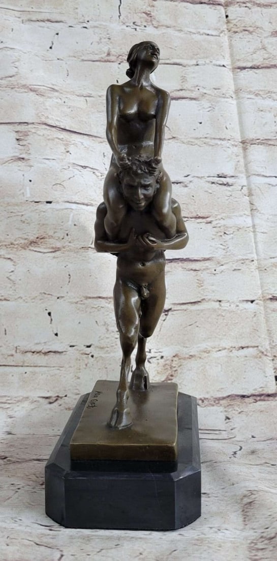 Piggy Rider Satyr and Nude Woman Bronze Sculpture: Very nice Art Deco Vienna Bronze Satyr with a nude nymph, Sitting on his shoulders. This sculpture is affixed on the finest marble and the sculpture shows a young faun with a sweet little nymph on his