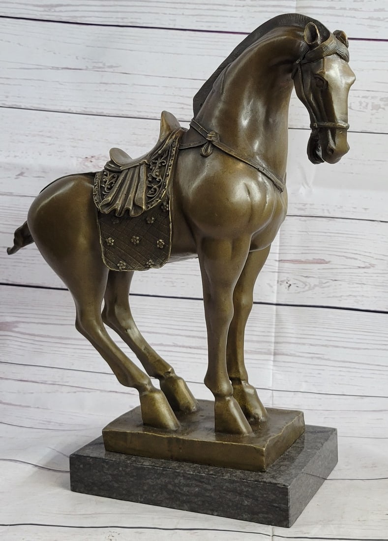 Tang Horse Modern Bronze Sculpture: Horses are known and loved for their agility, graceful movement, strong bodies, and sleek coat. They ignite a feeling of freedom and uncharted paths. This sculpture is perfect for any horse lover and