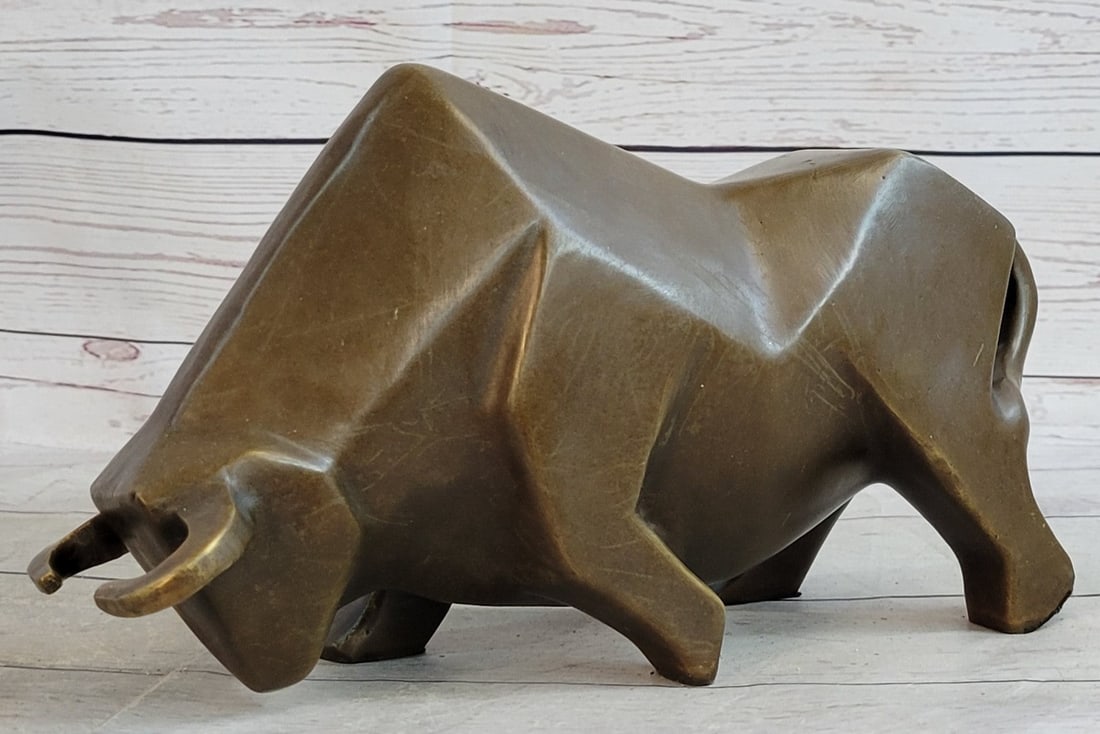 Modern Bull Bronze Statue: This is a great take on work that depicts an abstract large bull. The exaggerated portions of the bull make it an abstract gift for any bull or animal lover. This proportionally exaggerated bronze scu