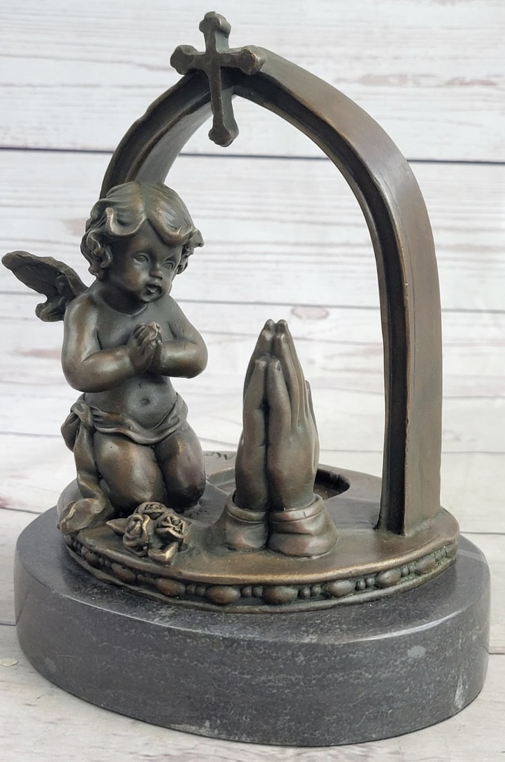 Winged Angel Bronze Sculpture: The Praying Angel Bronze Statues are made from solid and the finest bronze available. The bronze statues are manufactured in Spain by some of the finest bronze experts in the world. All of our bronze
