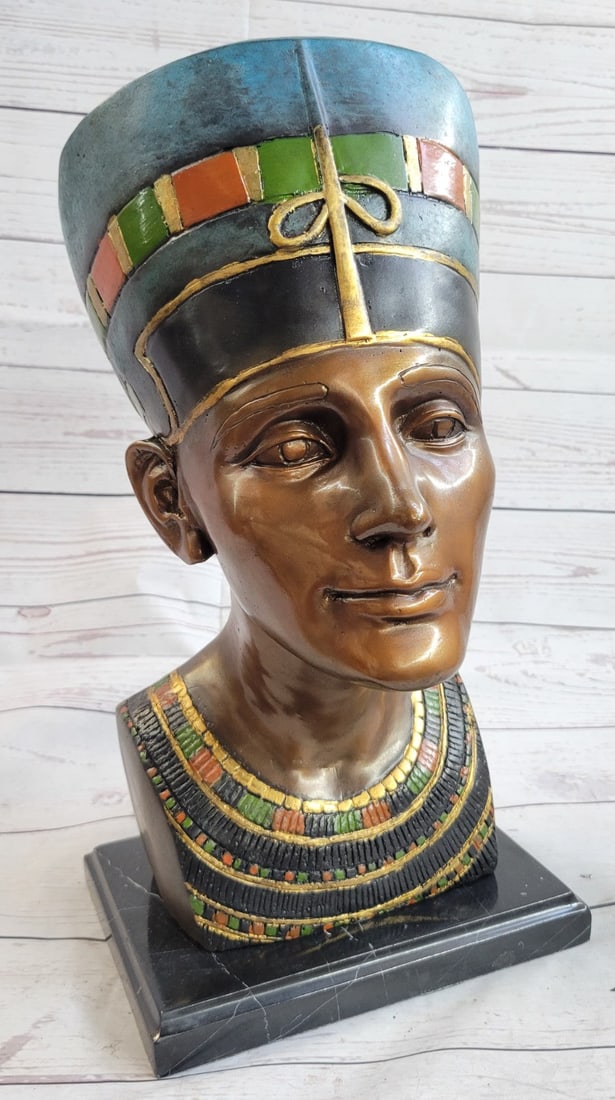 Queen Nefertiti Bronze Statue: This is a beautiful statue of Nefertiti. Her name roughly translates to the beautiful one is to come. Famed throughout the ancient world and within our present world for her outstanding beauty, Nefert