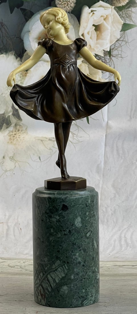 Young Baby Girl on Stage Bronze Sculpture: This adorable and very bright young baby-girl takes the stage, awing the crowd with her graceful presence. She prances around the stage on her tiptoes, one leg behind the other. She holds each end of
