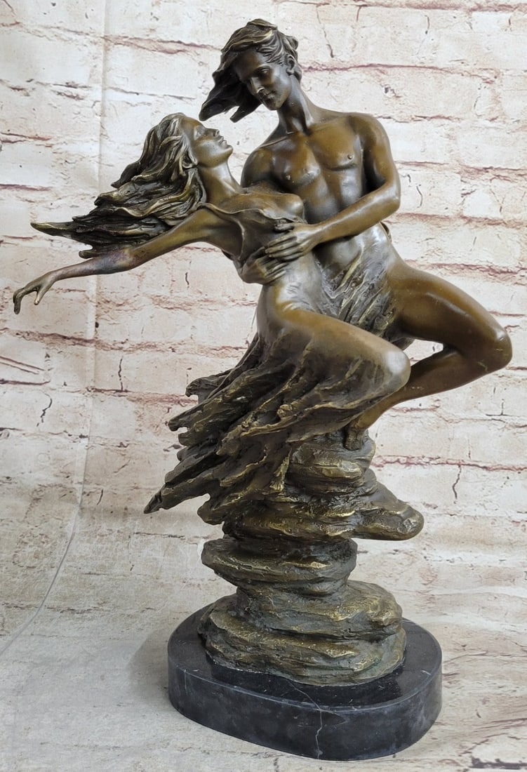 Modern Artwork Bronze Sculpture: A floating Couple is a recurring figure sculptured. The Mescaline male figure is a variation of the Striding Nude, holding his baby in the air. While focuses on the subject of emotion and speed, and e