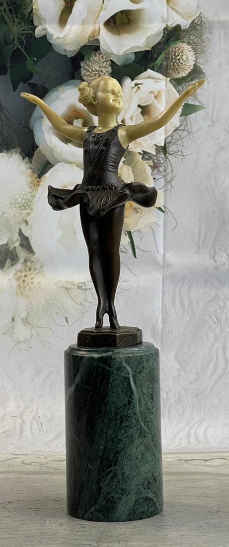 Young Girl Ballerina Bronze Sculpture: A young girl dances for a loving crowd. She raises her ballerina arms out to her sides and twirls on the tips of her tiny toes. Her tutu frills billow around her. Still so young, she is already a tale