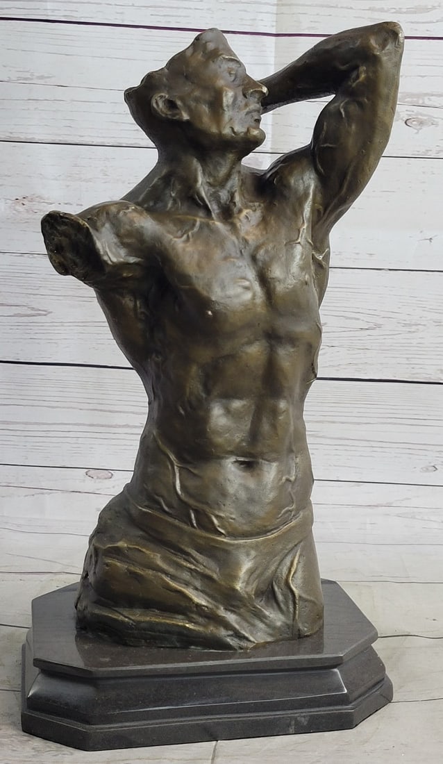 Male Bronze Sculpture: This abstract is incredible and the details on it are remarkable. This is a man that is missing one of his forearms and part of his head, yet with what is left you can obviously see it was meant to be