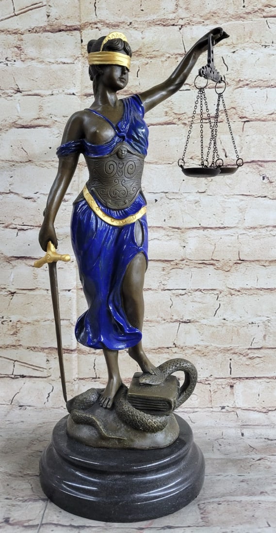 Blind Justice Bronze Sculpture: The Bronze Sculpture is of Lady Justice Roman goddess of Justice who is the symbolic personification of the moral force in judicial systems. As anciently depicted, the blindfolded Lady Justice, is see