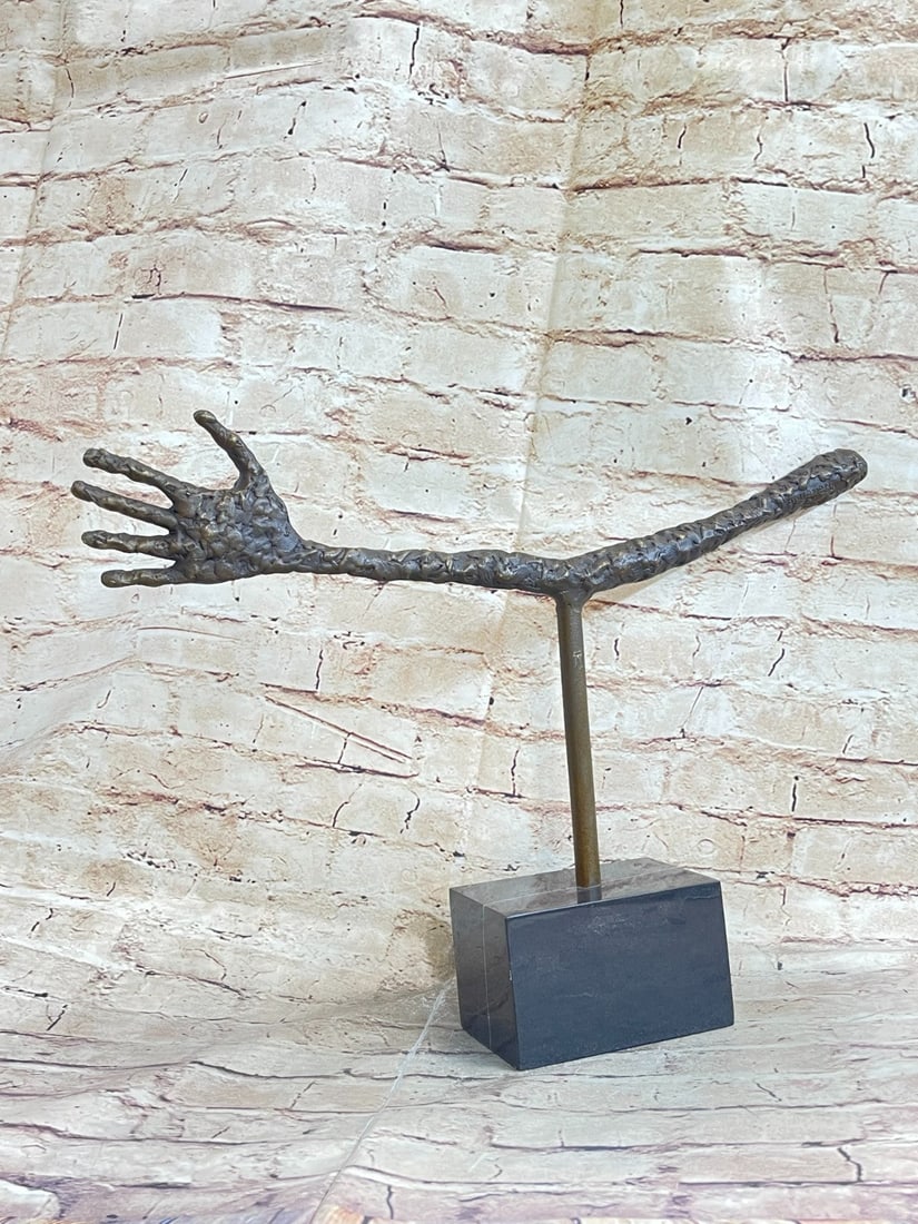 Mid Century Bronze Sculpture: The aesthetic power of this Sculpture resonates on many levels. The hand is our prime intermediary between the mind and the world, it allows thought to act upon and transform the world. The outstretch