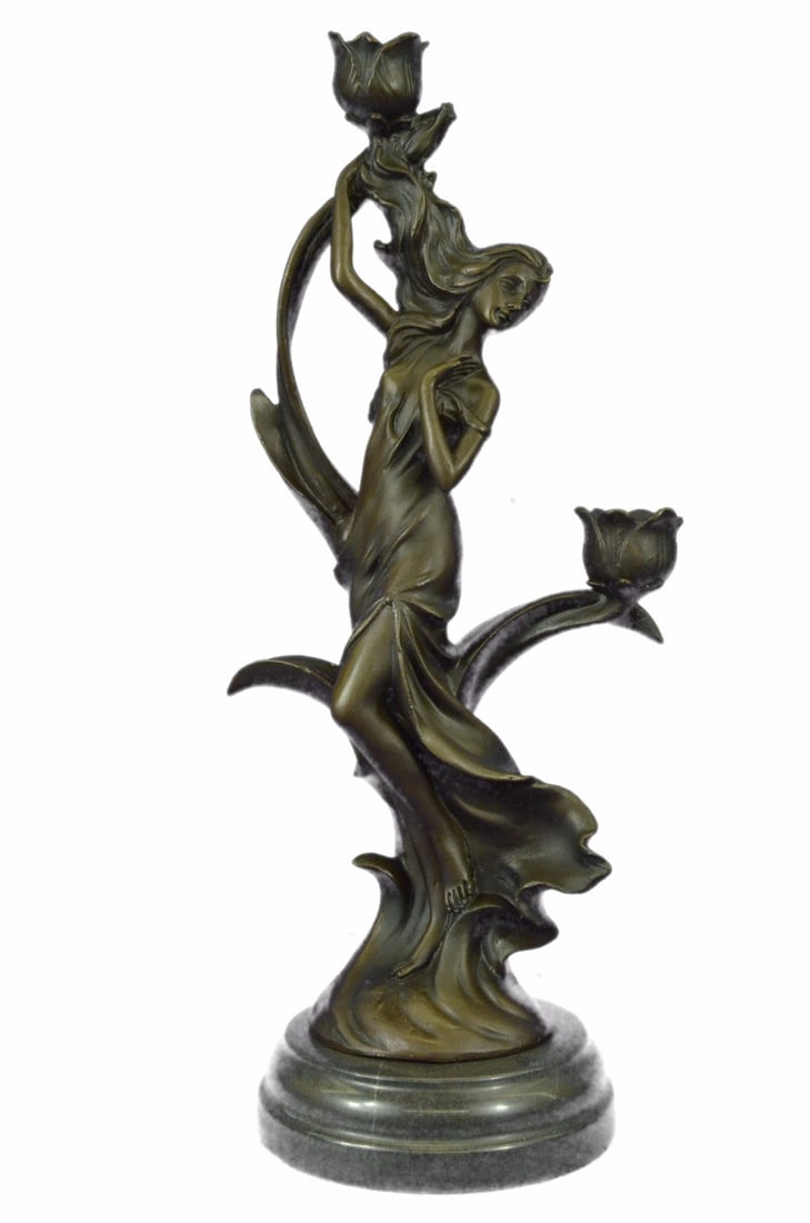 Candle Holder Candelabra Bronze Sculpture: This gorgeous candle holder depicts a woman relaxing as she wipes the sweat from her forehead. She places one hand behind her and exudes beauty from her inner being. She is dressed in a gorgeous flowi