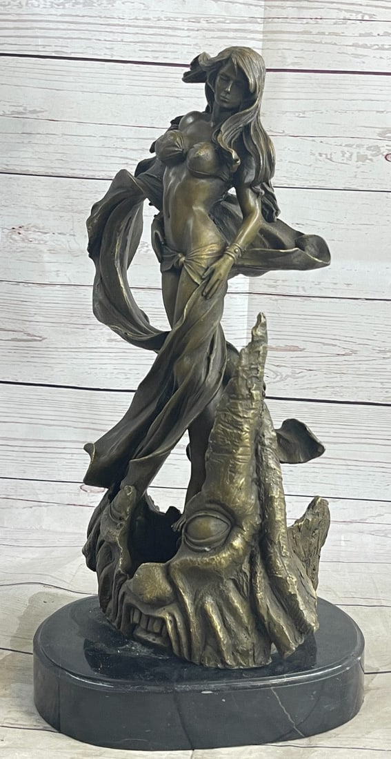 Sexy Nude Woman Swirl in Fabric Bronze Sculpture: The sexy woman stands confident and pensive in a swirl of fabric. The wind and cloth surround her sensuous curves in loops. Her long flowing hair breezes in different directions. She stands on a decon