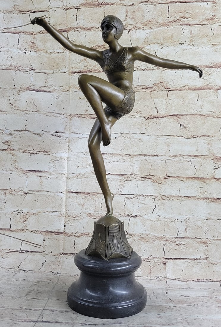 Art Nouveau Deco Bronze Statue: This large heavy bronze is entitled ’Phoenician Dancer. This sculpture has a brown patina and is mounted on a marble base. Dimensions: Height 19 X Width 12 inches. Weight: 12 LBS.