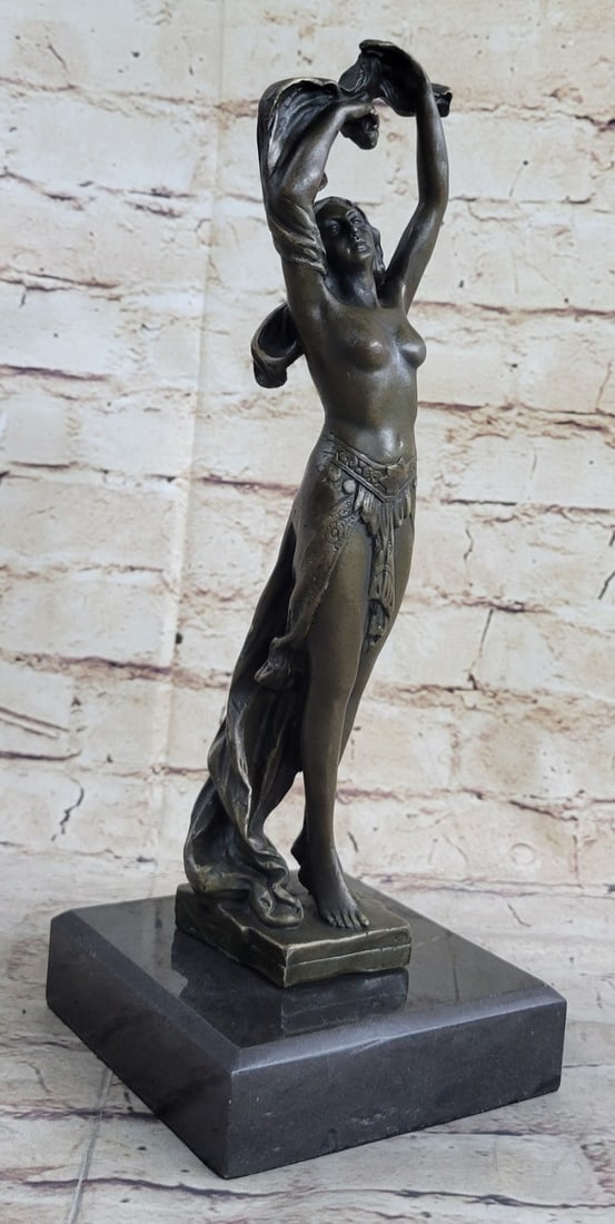 Nude Dancer Bronze Sculpture: Ease and composure emanate from this Art Nouveau sculpture. It’s a wonderfully designed and executed work of art, from the delicately poised stance of the woman with both arms above her head to the