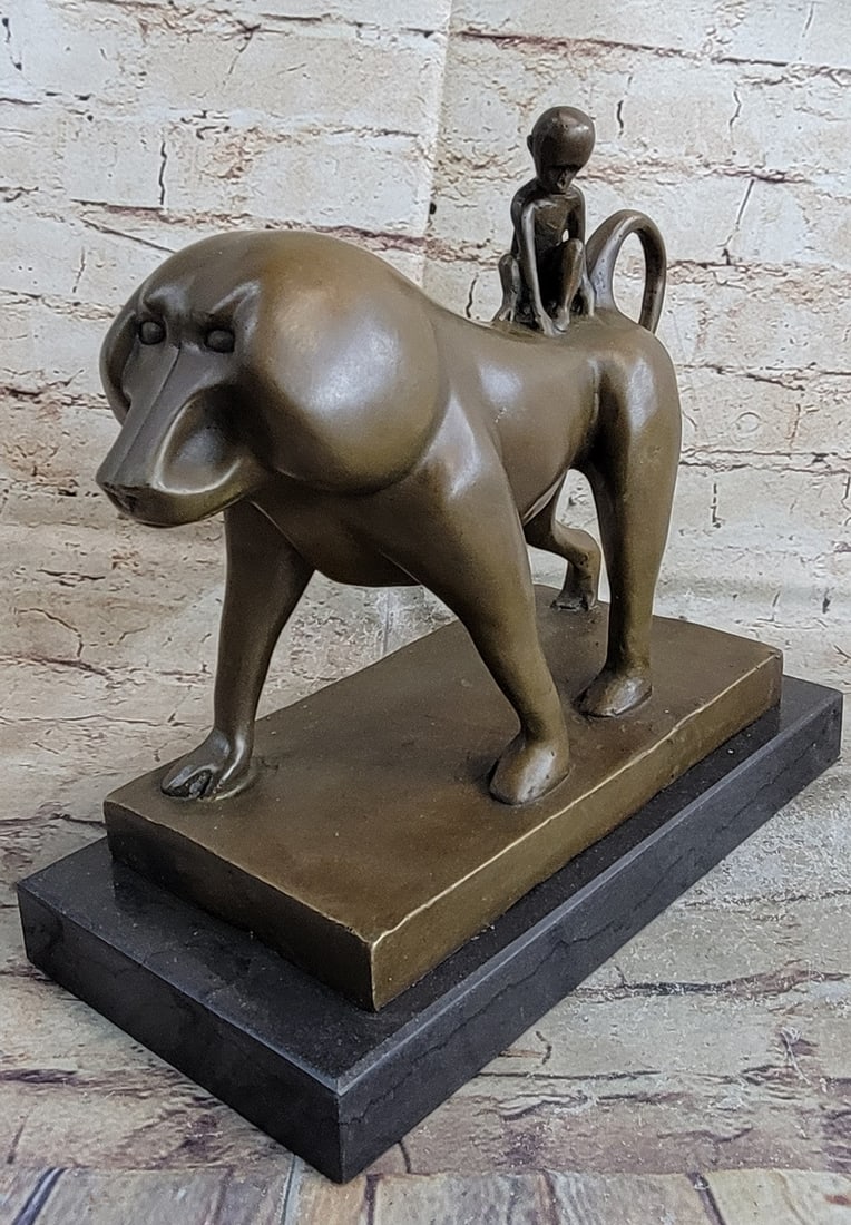 Mother Baboon Baby Bronze Sculpture: This adorable statue features a baboon mother carrying her youngling on her back. Baboons are African Old-World monkeys. They range in size and weight depending on the species. Carrying their young on