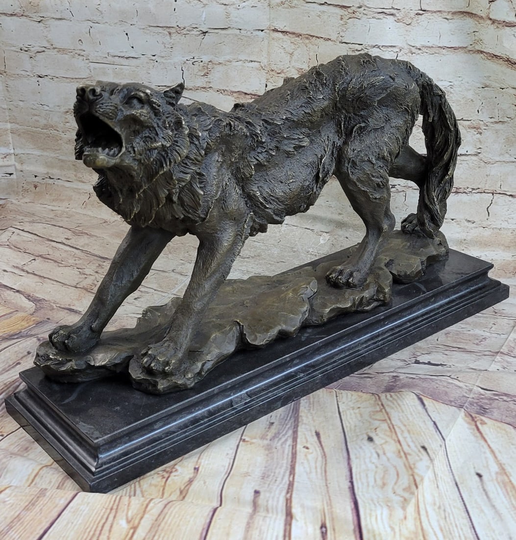 Howling Wolf to the Moon Bronze Sculpture: When people think of wolves they think of their lethal hunting skills, howling and the pack. The creation of a wolf family is unique for animals. Wolves are social predators that live in nuclear famil