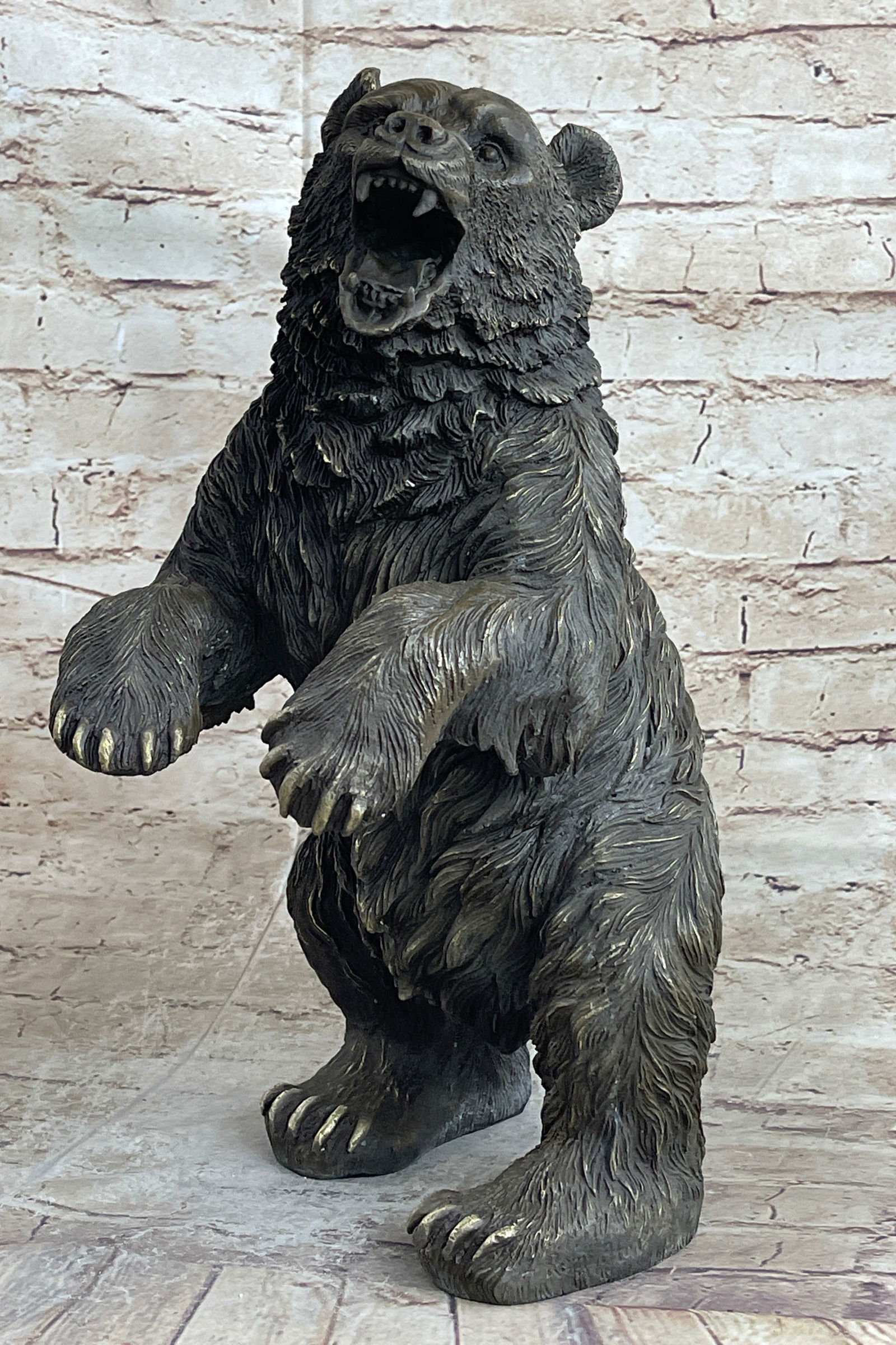 Brown Bear Bronze Sculpture: Standing on his hind legs tall and fierce he lets out a growl that rolls through the mountains and the valleys of the forest. He stands his ground and claims his territory. Although bears can be cute