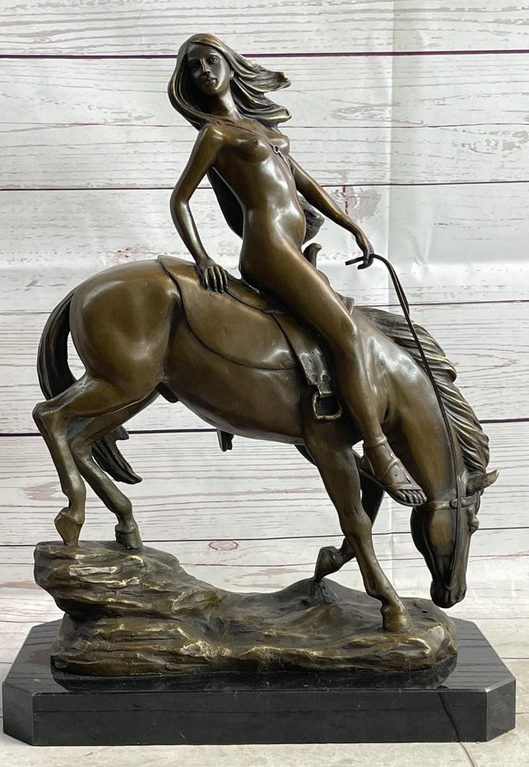 Wolf Lady Bronze Sculpture: This story inspired the making of the Bronze celebrating this event and was cast using the ancient Lost Wax Method stained in brown patina finish for preservation and mounted atop a marble base. Dimen