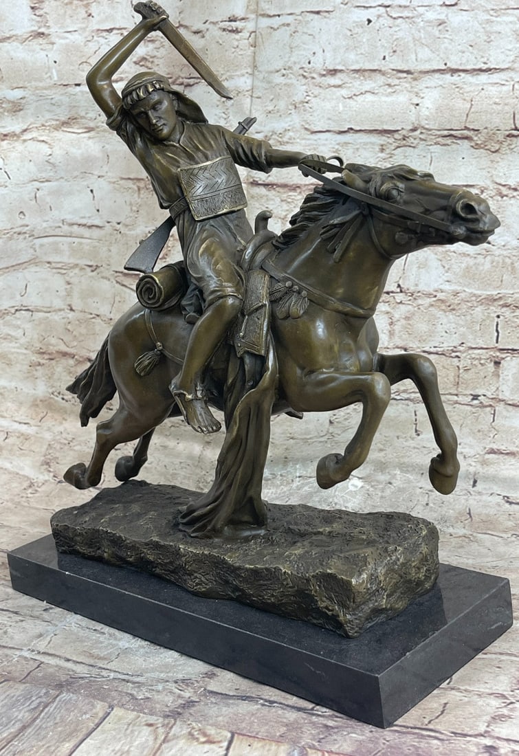 Arab Warrior Bronze Sculpture: This bronze sculpture was cast using the lost cast method and mounted on a marble base. Dimensions: Height 15 X Width 18 inches. Weight: 23 LBS.