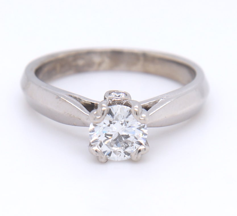 Majestic Platinum Round Brilliant Cut Diamond Engagement Ring: Majestic Platinum approximate 0.50ctw Round Brilliant Cut Diamond Solitaire Engagement Ring. Total weight of Ring 2.80 Grams. Ring Size 4.5"