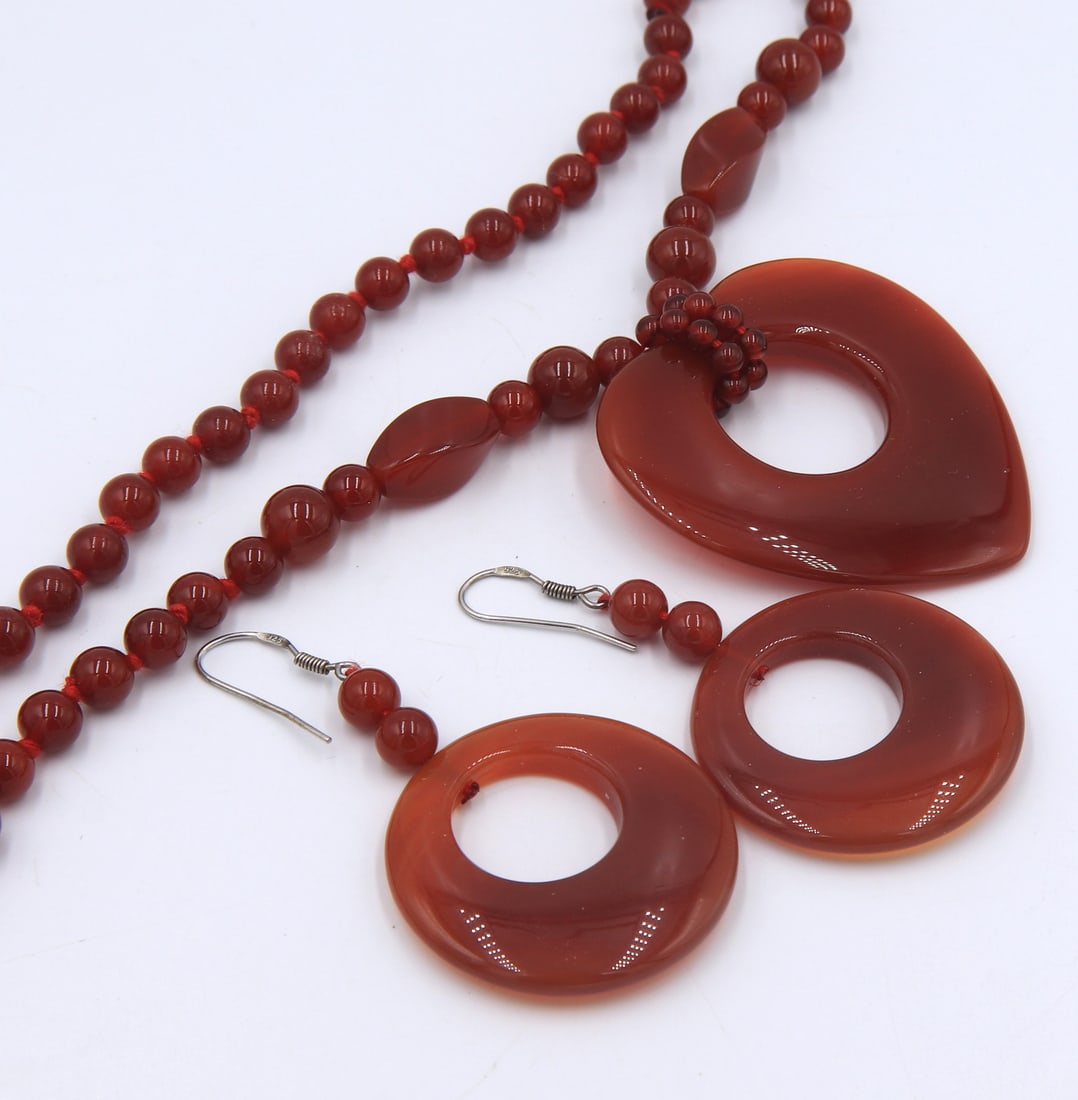 Set of Red agate beads necklace with dangle earrings: Set of Red agate beads 31 inches necklace with dangle earrings. Total weight of set 73.9 grams.