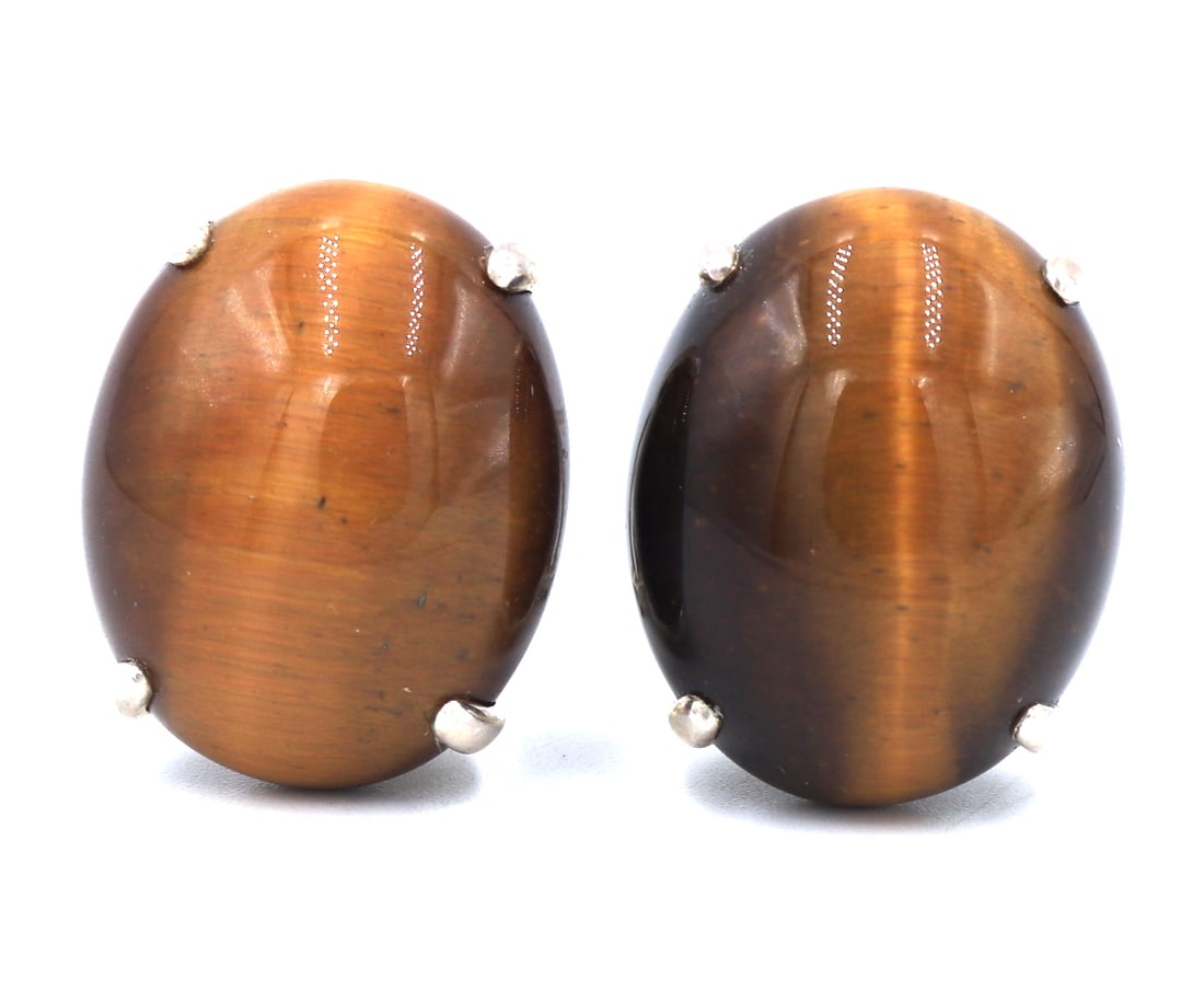 925 Sterling silver Tiger eye earrings: 925 Sterling silver Tiger eye earrings. Total weight of earrings 13.4 grams.