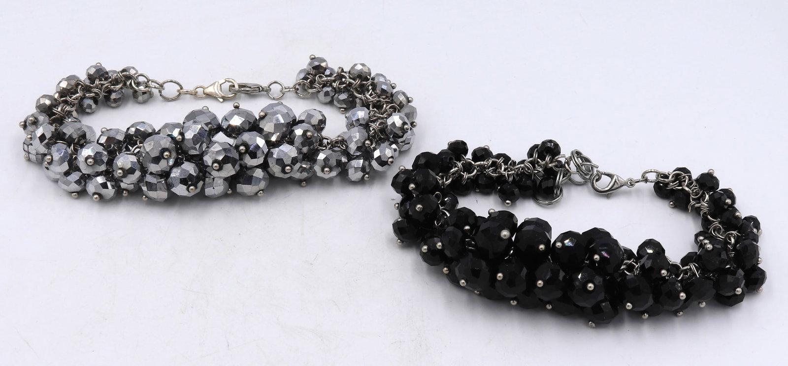 Lot of 2 crystal cluster bracelets: Lot of 2 crystal cluster 7 inches bracelets. Total weight of lot 102.3 grams.