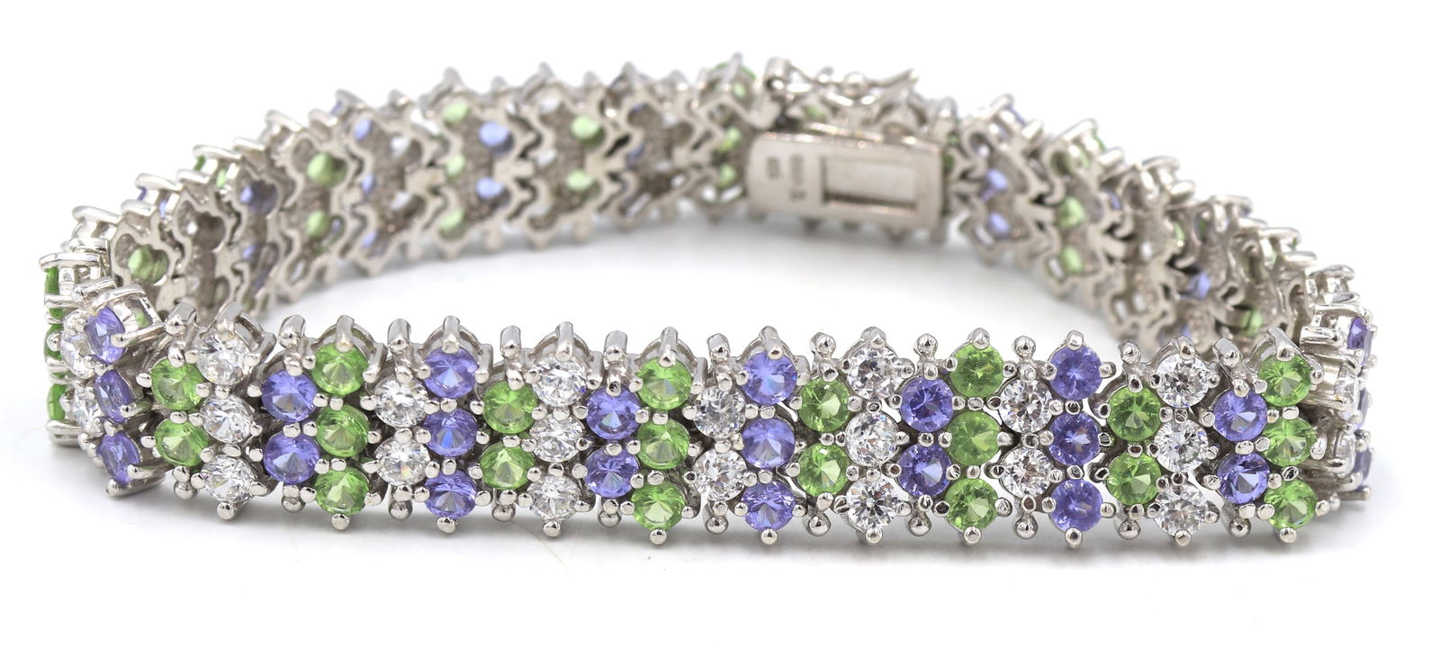 925 Sterling silver colorful cubic zirconia bracelet: 925 Sterling silver colorful cubic zirconia 7 inches bracelet. Total weight of bracelet is 32.3 grams.