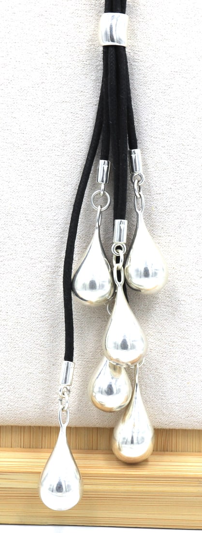 925 Sterling silver signed tear drop pendant on multi strand black cord necklace: 925 Sterling silver signed tear drop pendant on multi strand black cord necklace. Total weight of necklace is 34.2 grams.
