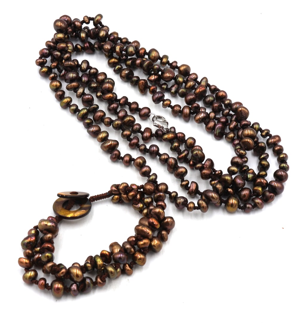 Set of brown pearl necklace and bracelet: Set of brown pearl 62 inches necklace with 925 sterling silver clasp and 7.5 inches 3 row bracelet. Total weight of set is 110.5 grams.