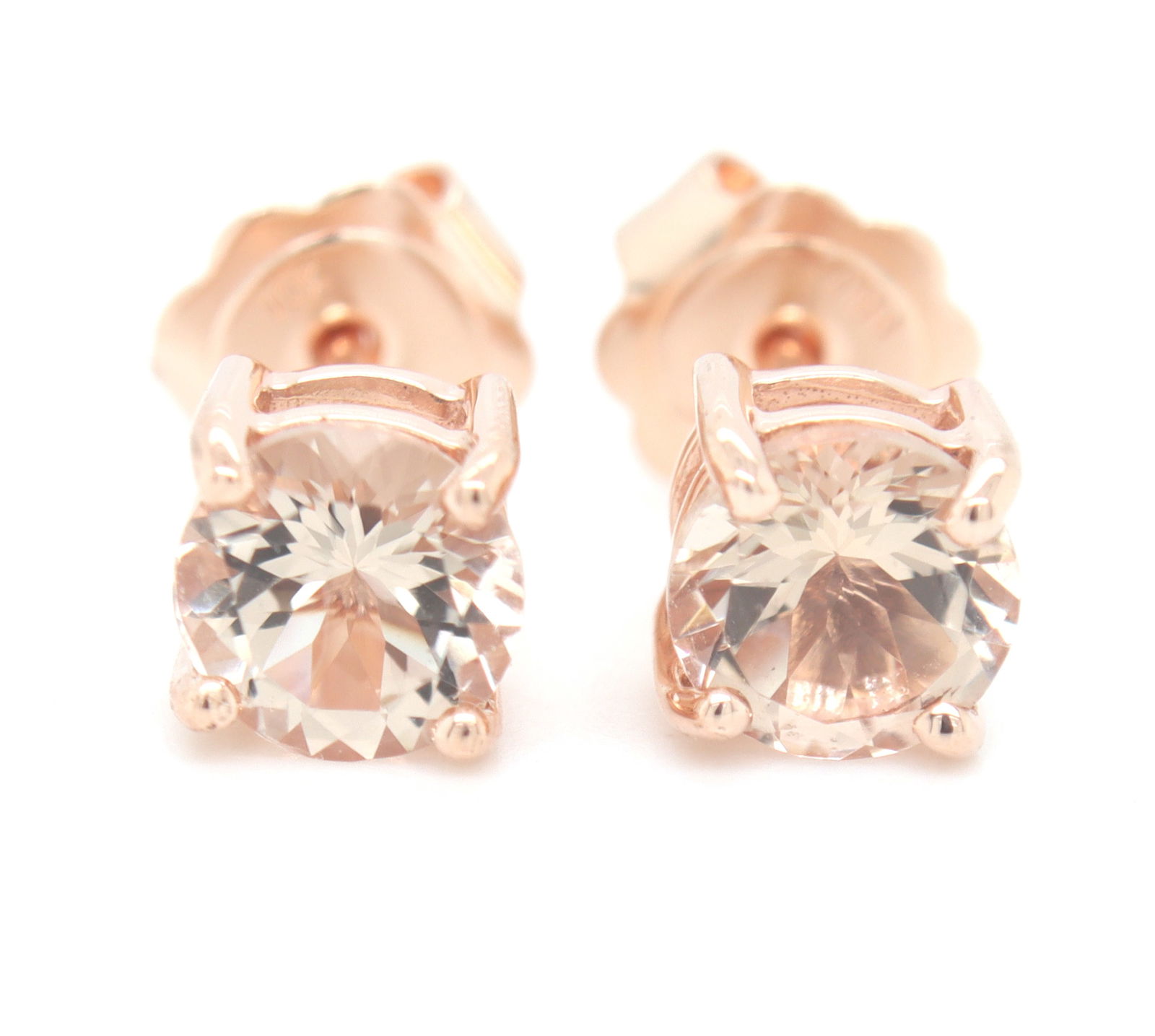 10kt Yellow gold round brilliant cut peach morganite stud: 10kt Yellow gold round brilliant cut peach Morganite stud earrings. Total weight of earrings is 1.60 grams.