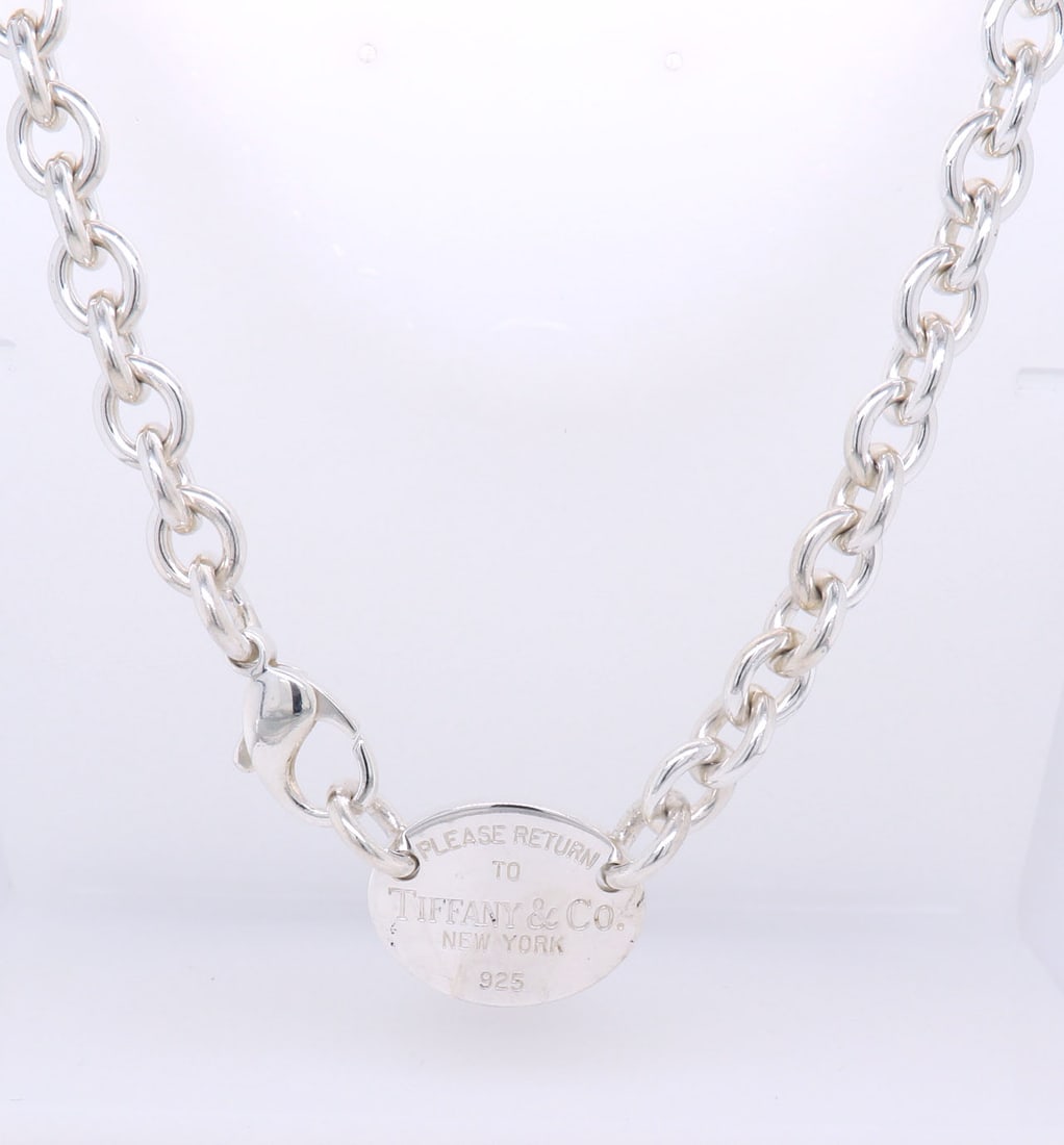 Tiffany & Co Oval Tag Necklace in Sterling Silver: Tiffany & Co Oval Tag 15 inches Necklace in 925 Sterling Silver. Total weight of Necklace 53 Grams.