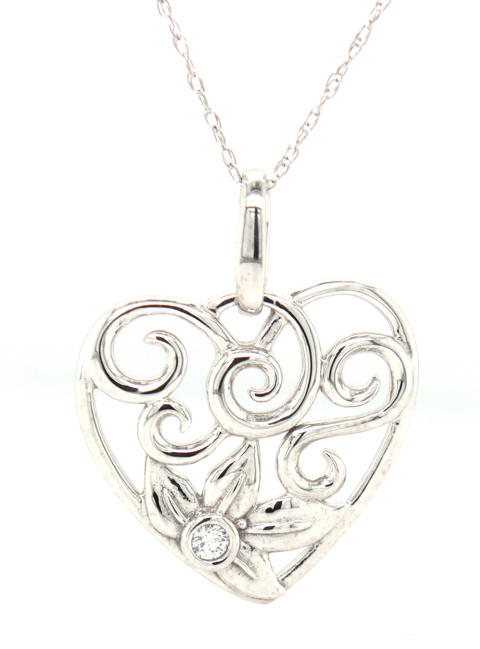 14kt White gold diamond swirl heart pendant on chain: 14kt White gold diamond swirl heart pendant on 18-inch chain necklace. The total weight of the necklace is 2.60 grams.