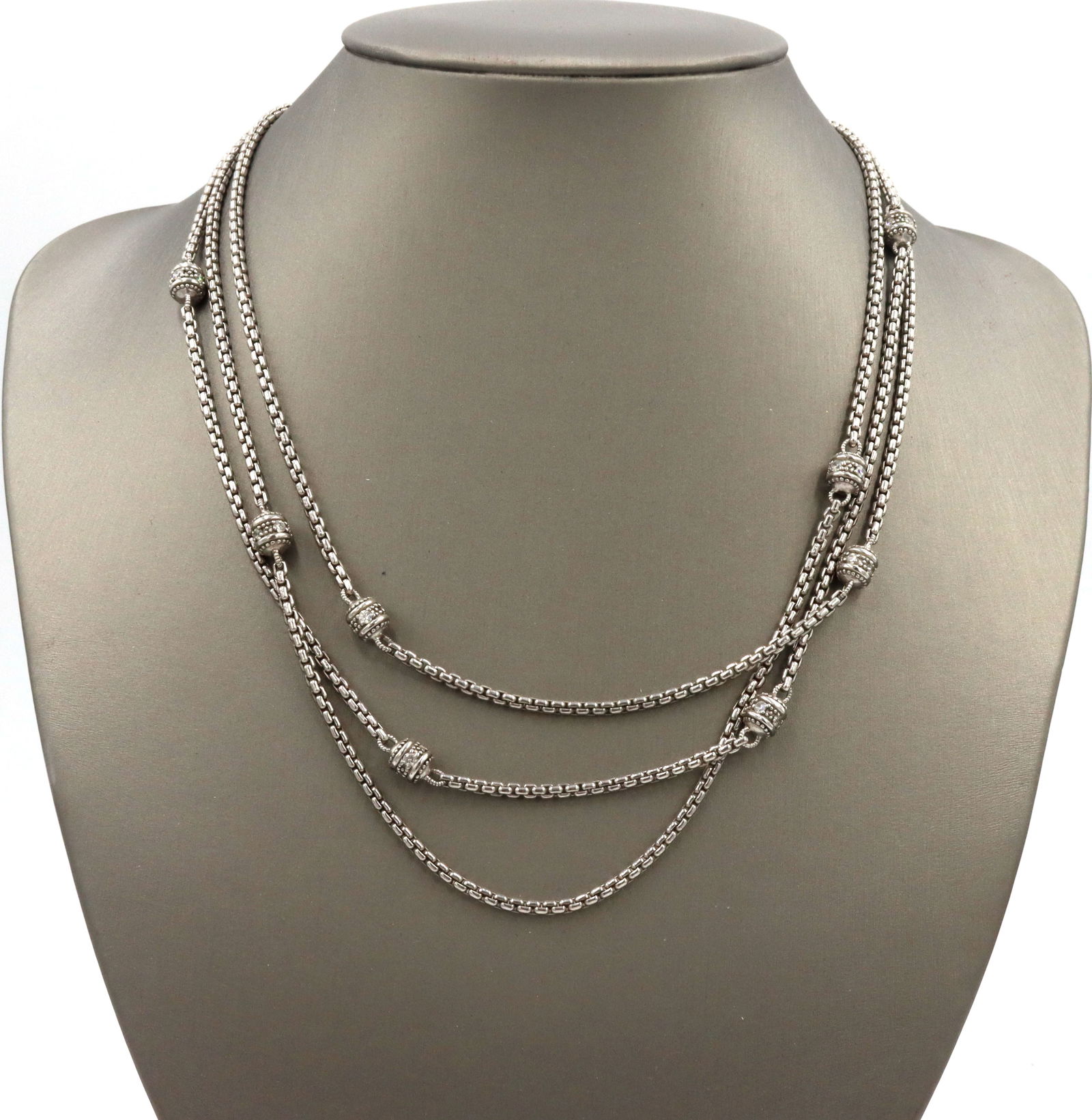 Judith Ripka crystal 3 row strand necklace: Judith Ripka crystal 3 row strand 18-inch necklace in 925 sterling silver. The total weight of the necklace is 55.1 grams.